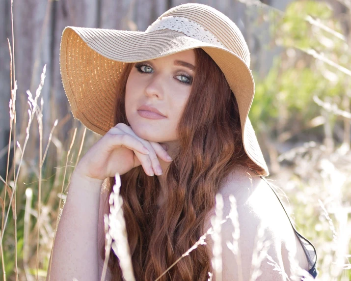 a close up of a person wearing a hat, a portrait, cg society contest winner, beautiful alluring teen, summer setting, straw, sydney hanson