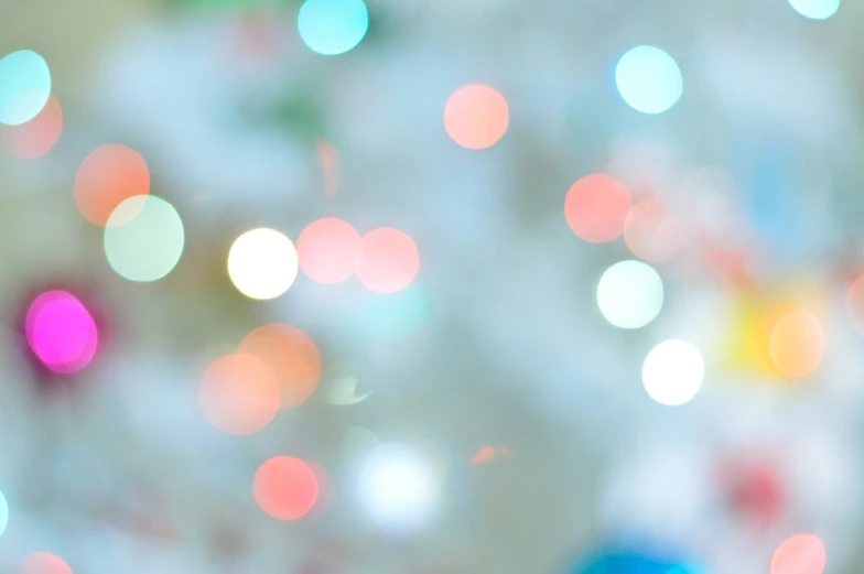 a teddy bear sitting in front of a christmas tree, pexels, light and space, colorful refracted sparkles, dots abstract, subtle blue, pale colors
