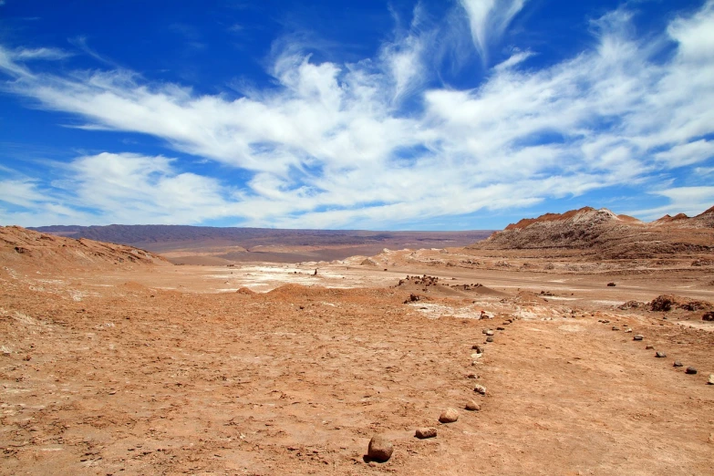 a dirt road in the middle of a desert, land art, mars vacation photo, chile, ancient city of white stone, moonwalker photo