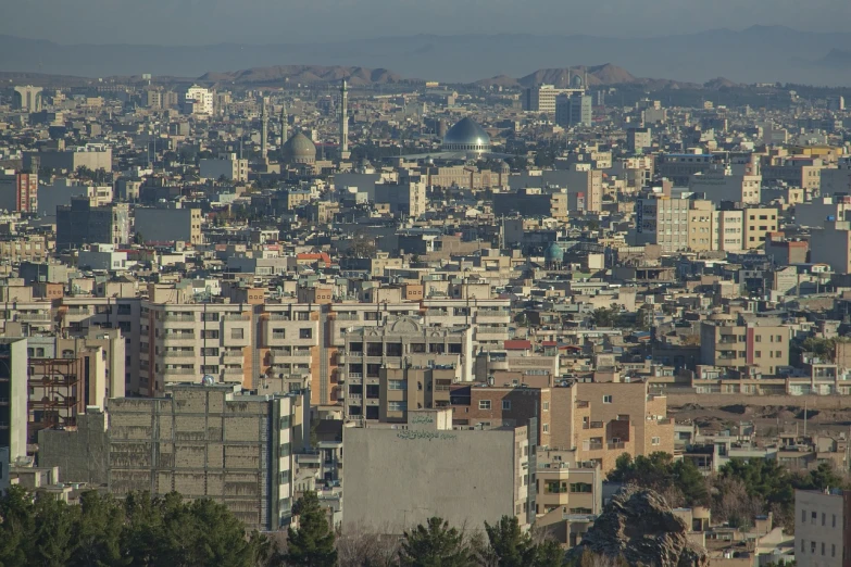 a large city filled with lots of tall buildings, dau-al-set, sayem reza, zoomed out view, japanese city, iran