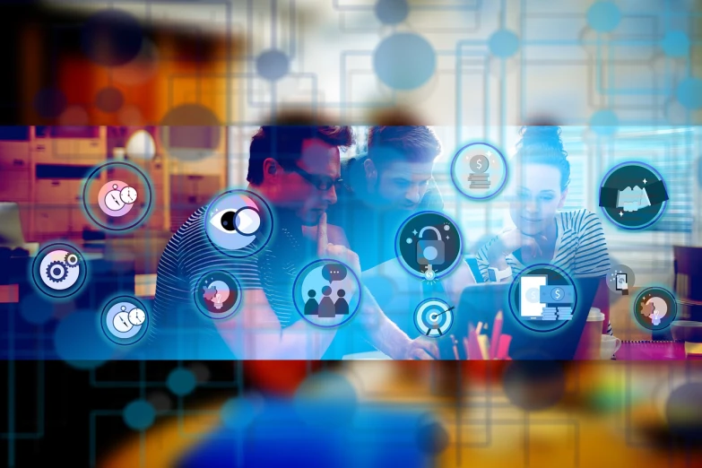 a group of people sitting at a table working on laptops, a digital rendering, shutterstock, digital art, iconography background, blurry image, avatar image, integrating with technology!!