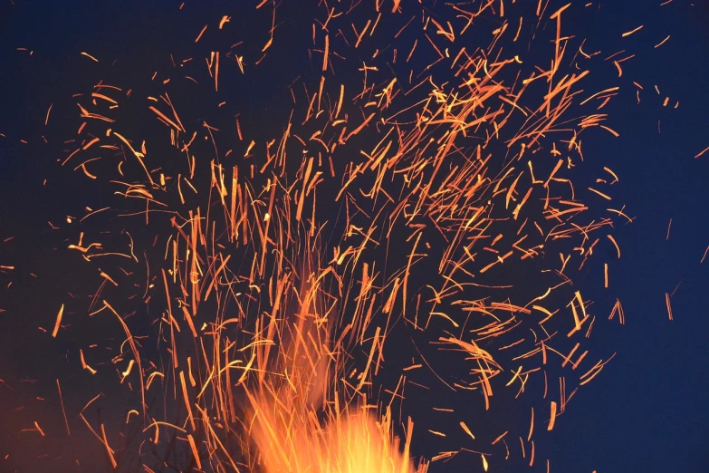 a close up of a fire with sparks coming out of it, figuration libre, fire from sky, ivan shishk, summer night, 3 4 5 3 1