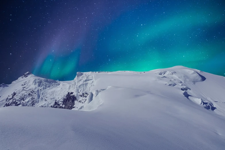 a person standing on top of a snow covered mountain, a matte painting, inspired by Johan Christian Dahl, shutterstock, dramatic aurora borealis, distant mountains lights photo, beautiful composition 3 - d 4 k, lapland