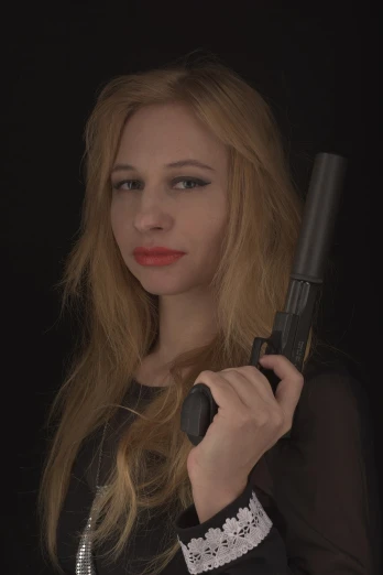 a woman with a gun in her hand, a portrait, flickr, portrait of kim petras, britt marling style, italian looking emma, young female