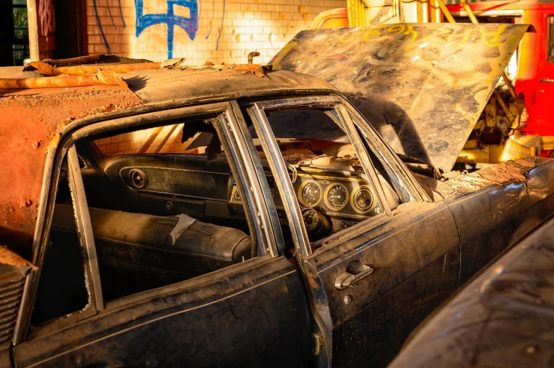 a car that is sitting in a garage, auto-destructive art, burnt, full res, berlin, interior view