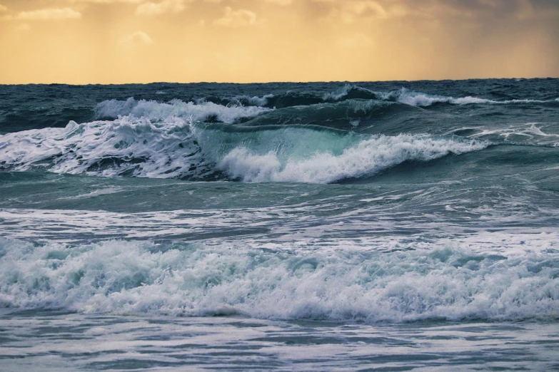 a man riding a wave on top of a surfboard, pexels, fine art, storm on horizon, cornwall, wikimedia, pc wallpaper