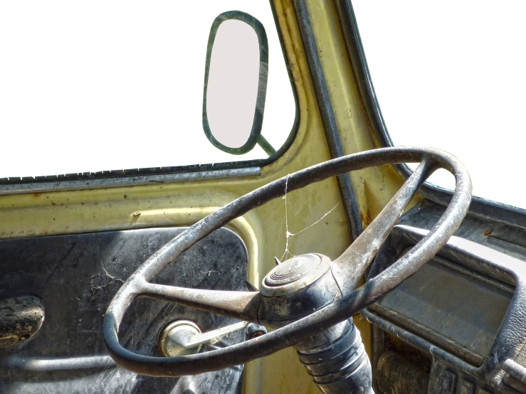 a close up of a steering wheel on a truck, a photo, by Cornelisz Hendriksz Vroom, realism, broken mirrors composition, yellowed with age, views front side and rear, square