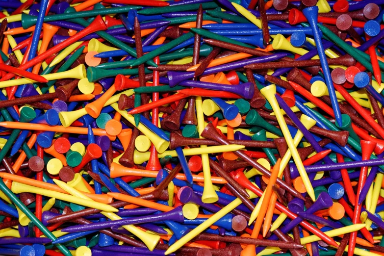 a pile of assorted colored golf tees, by Juan O'Gorman, vibrant patterns, rivets, tiny sticks, 1 0 2 4 farben abstract