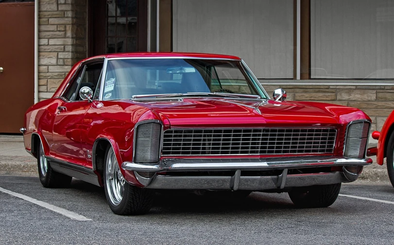 a red car is parked in a parking lot, a portrait, by James Warhola, pexels contest winner, modernism, the last v 8 interceptor, highly detailed hd, redneck, arrow