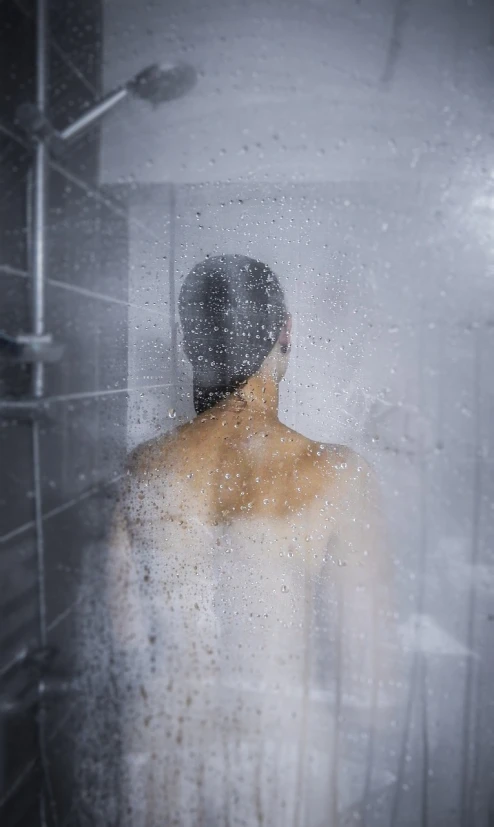 a man that is standing in a shower, by david rubín, pexels, conceptual art, mysterious portrait of a woman, background image, hyperrealistic photograph, 😭🤮 💔