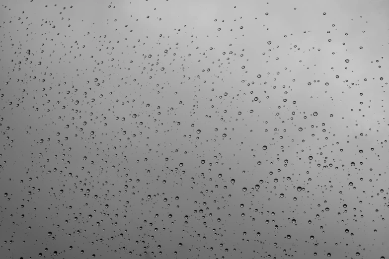 a black and white photo of raindrops on a window, inspired by Jan Rustem, pexels, minimalism, hq 4k phone wallpaper, gustave dore\' background, 4k hd wallpaper:4, gray sky