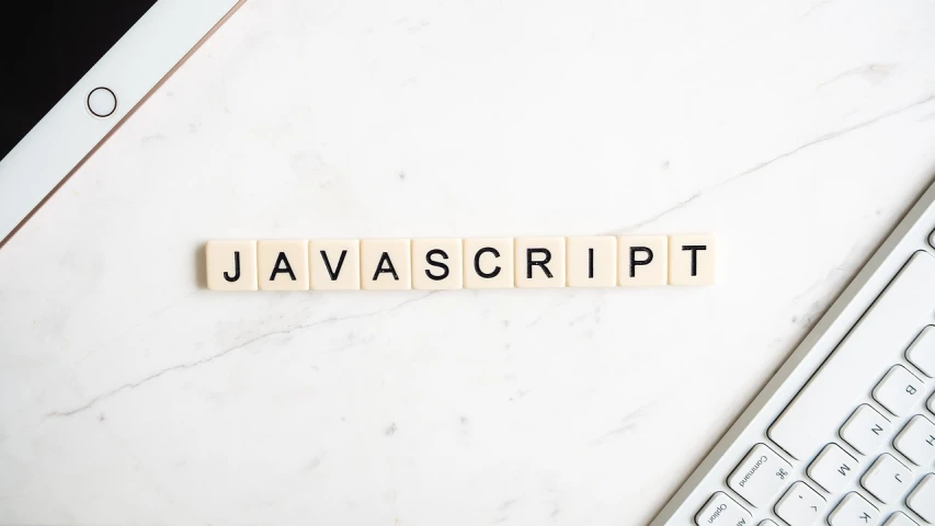 the word javascript spelled in scrabbles next to a keyboard, a screenshot, inspired by Johannes van Haensbergen, avatar image, crisp clean shapes, waveforms on top of square chart, slight overcast lighting