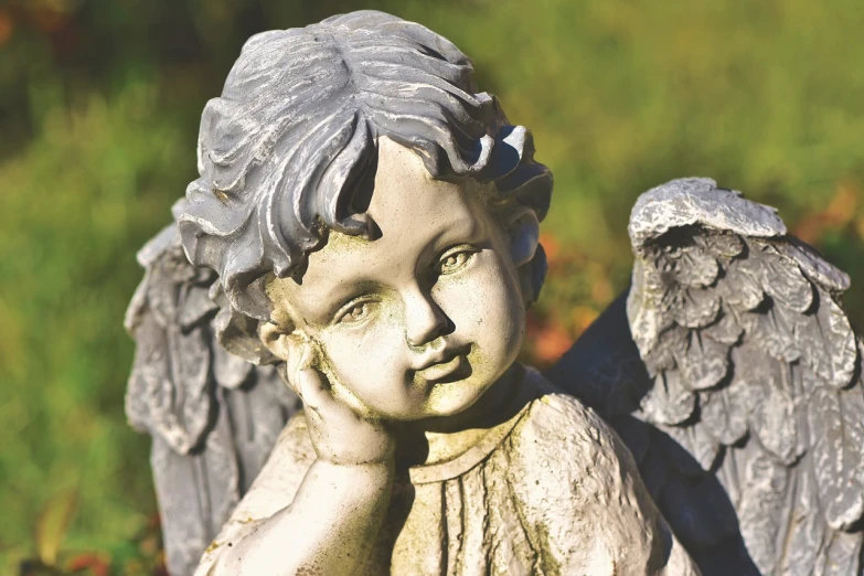 a close up of a statue of an angel, by Marie Angel, pixabay, realism, little kid, bashful expression, screengrab, relaxing