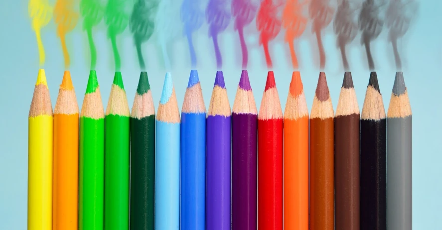 a group of colored pencils sitting next to each other, a pastel, by Jan Rustem, trending on pixabay, crayon art, colored smoke clouds, inverted colors, istock, brand colours are green and blue