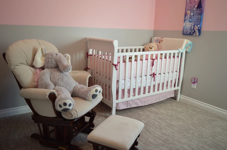 a teddy bear sitting in a rocking chair next to a crib, pixabay, pink accents, grey color scheme, cream - colored room, wide overhead shot