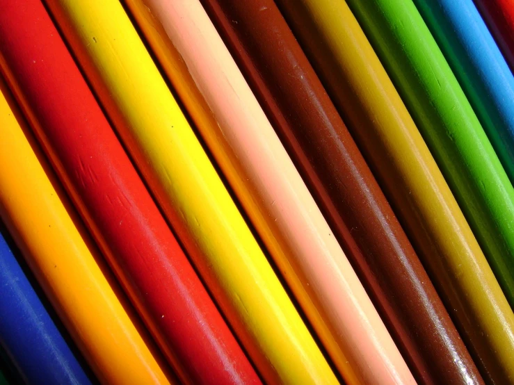 a close up of a bunch of colored pencils, by Juan O'Gorman, color”, colorful”, solid colour background”