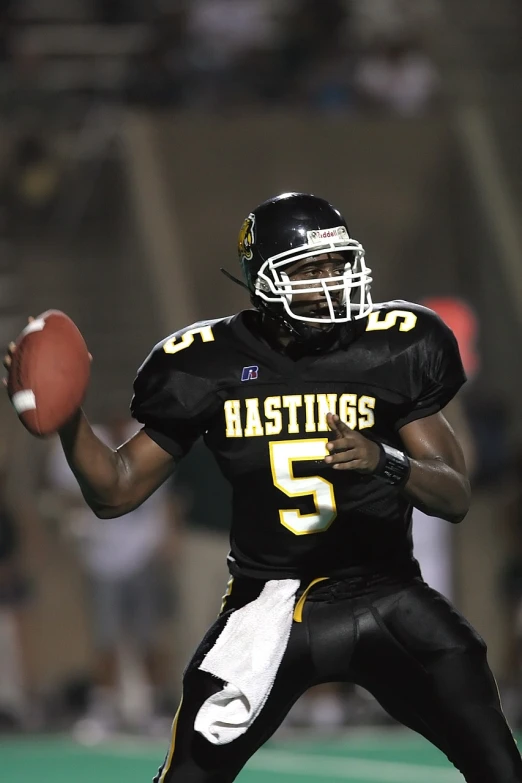 a football player about to throw the ball, happening, rodney matthew, five score years ago, hauting, university