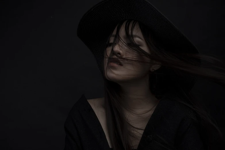 a woman with long hair wearing a black hat, inspired by irakli nadar, unsplash, digital art, windblown dark hair, chengwei pan, professional studio photograph, song nan li