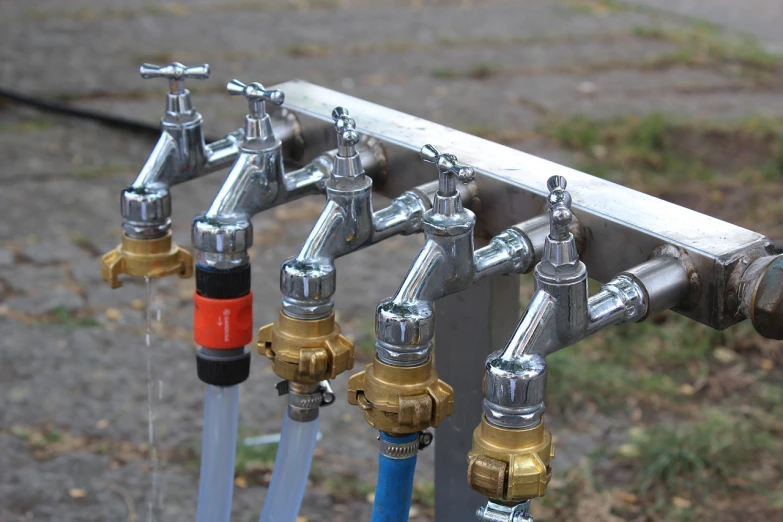 a bunch of hoses that are connected to a fire hydrant, by Alexander Fedosav, beer, sink, very award - winning, taps with running water