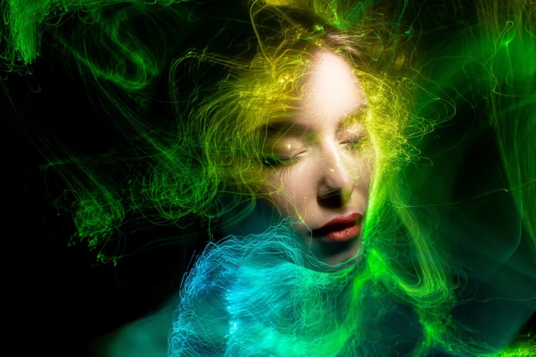 a close up of a person with green hair, by Adam Marczyński, digital art, glowing aura around her, photo of a beautiful woman, high quality fantasy stock photo, tendrils of colorful light
