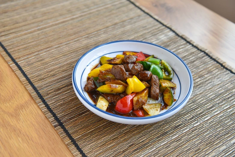 a close up of a bowl of food on a table, a picture, shin hanga, lomo saltado, high detail product photo