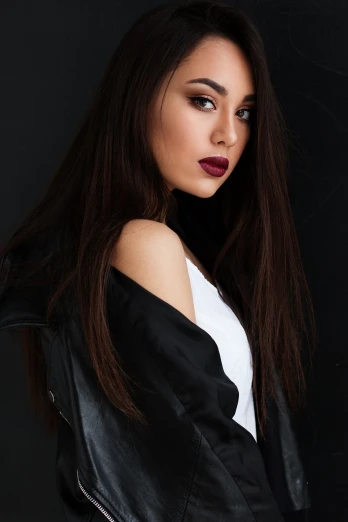 a woman in a black leather jacket posing for a picture, a portrait, tumblr, hurufiyya, ariana grande photography, in style of kyrill kotashev, deep red lips, pokimane