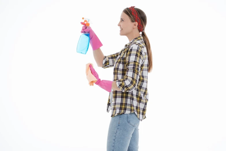 a woman in plaid shirt holding a pink and blue spray bottle, a picture, shutterstock, plasticien, majestic sweeping action, reference sheet white background, half body photo, maid