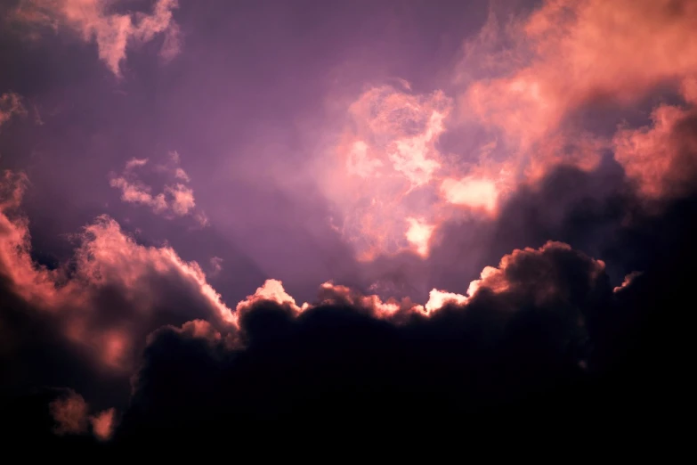 a plane flying through a cloudy purple sky, a picture, romanticism, sun after a storm, background ( dark _ smokiness ), ceremonial clouds, purple and pink