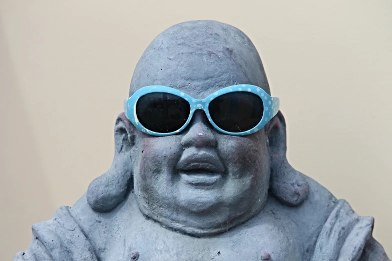 a statue of a laughing buddha wearing sunglasses, a statue, neo-dada, smooth blue skin, photo illustration, obese, fully body photo