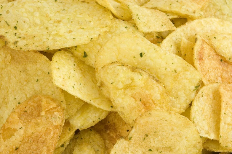 a close up of a pile of potato chips, shutterstock, renaissance, high quality product image”, viewed from the side, vert coherent, pepper