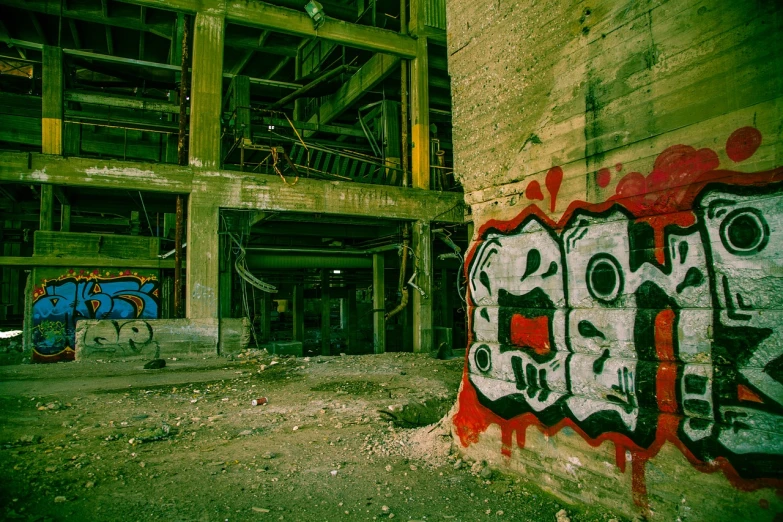 a building that has some graffiti on it, flickr, graffiti, post apocalyptic palace interior, red faced, cinestill 800t eastmancolor, view from the side”