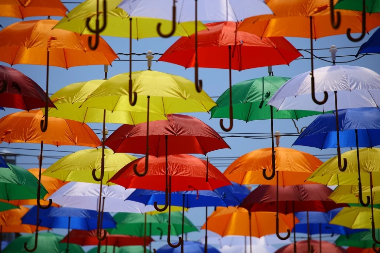 a sky filled with lots of different colored umbrellas, by Jon Coffelt, precisionism, colorful high contrast hd, vladimir krisetskiy, colorful signs, hilarious
