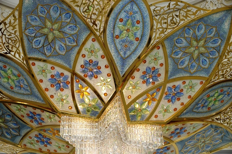 a chandelier hanging from the ceiling of a building, a detailed painting, flickr, cloisonnism, oman, star roof, ( art nouveau ), superb detail 8 k