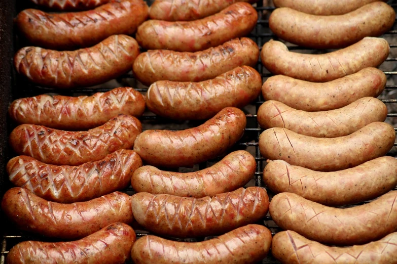 a bunch of sausages that are on a grill, a portrait, pixabay, renaissance, ((in a super market costco)), ffffound, zig zag, recipe