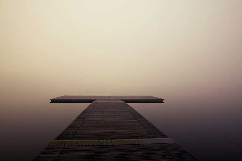 a dock in the middle of a body of water, a picture, by Karl Buesgen, minimalism, beige mist, infinity, taken with my nikon d 3, (by tom purvis)