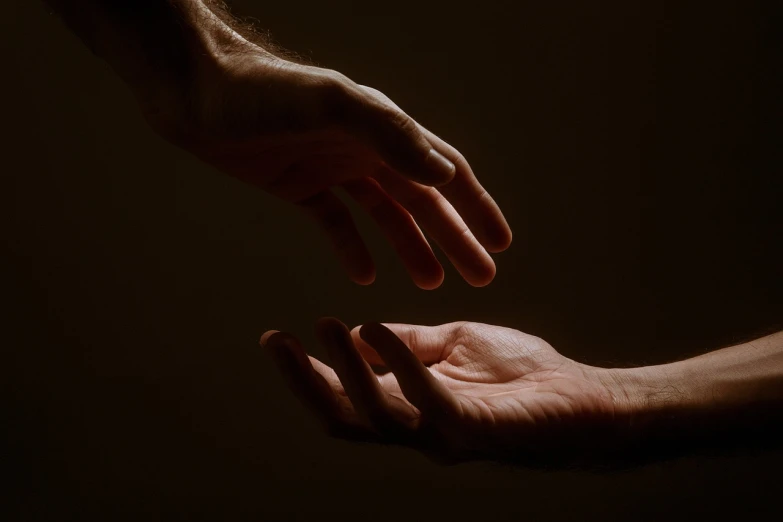 two hands reaching towards each other in a dark room, by Maciej Kuciara, paul barson, repetitiveness, open palm, compassion