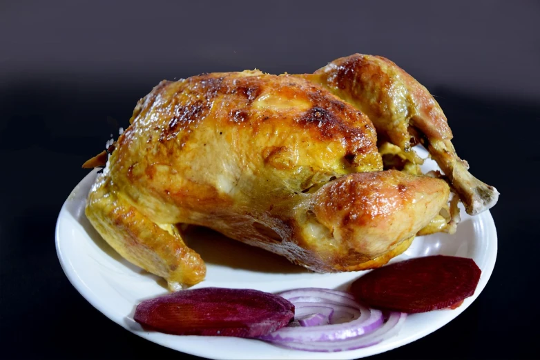 a chicken sitting on top of a white plate, a digital rendering, realism, oven, food photo, mid shot photo