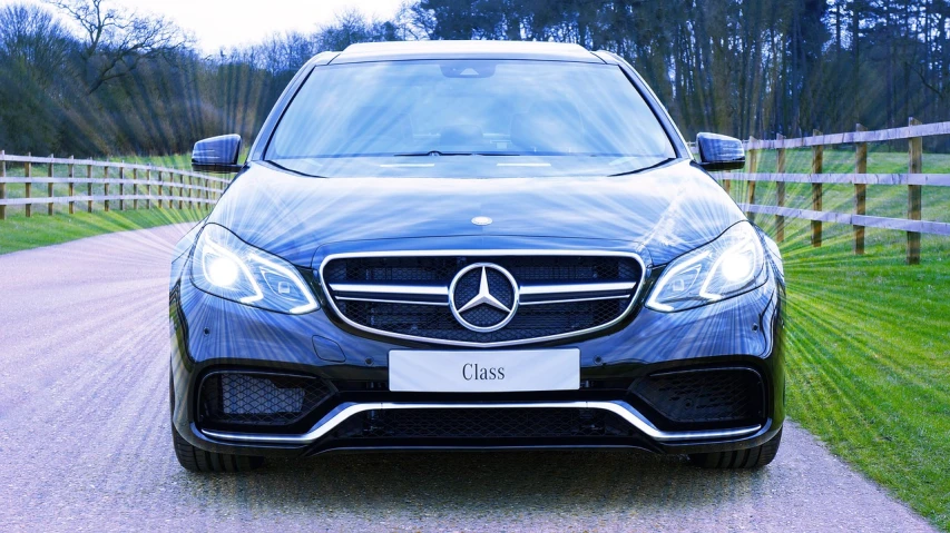 a mercedes suv parked on the side of a road, trending on pixabay, modernism, transparent black windshield, spectacled, front of car angle, rectangular