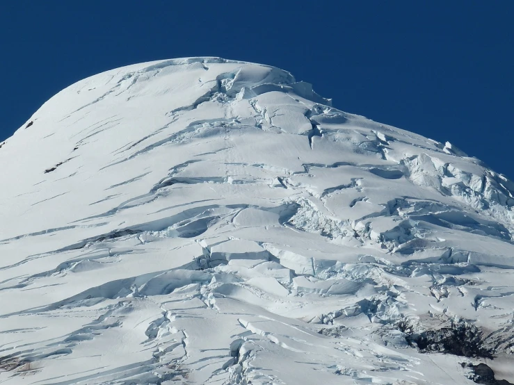 a man riding a snowboard down the side of a snow covered mountain, a portrait, by Jay Hambidge, flickr, hurufiyya, complex massive detail, chile, dome, a 15 foot tall