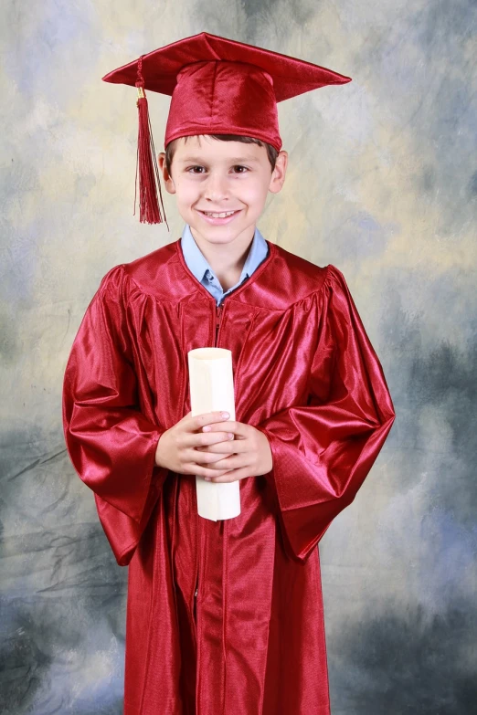 a young boy in a graduation gown holding a diploma, by Alison Geissler, digital photo, wearing red clothes, catalog photo, maroon and white