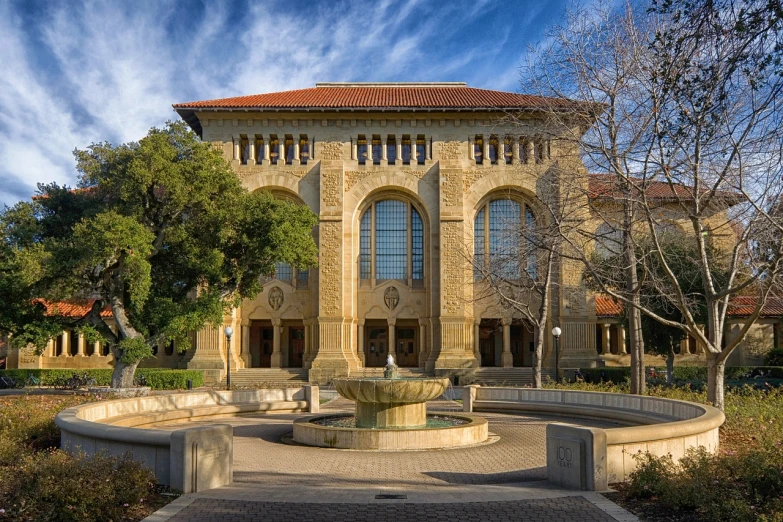 a large building with a fountain in front of it, by Leo Michelson, flickr, academic art, dirk dzimirsky, bay area, buildings carved out of stone, tx