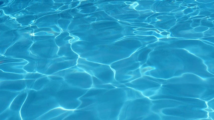 a person swimming in a pool with a frisbee, by Rhea Carmi, shutterstock, fine art, vertical wallpaper, blue reflections, detailed texture, wallpaper - 1 0 2 4