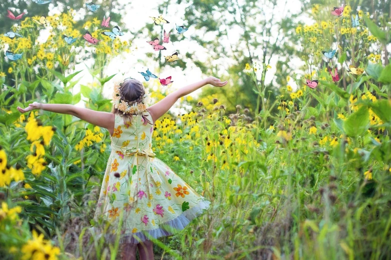 a little girl standing in a field of flowers, a picture, pixabay, process art, yellow butterflies, dancing gracefully, afternoon hangout, whimsy