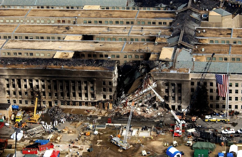 an aerial view of a building being demolished, by John Keane, flickr, renaissance, pentagon, fallen columns, closeup!!!!!!, secret service photos