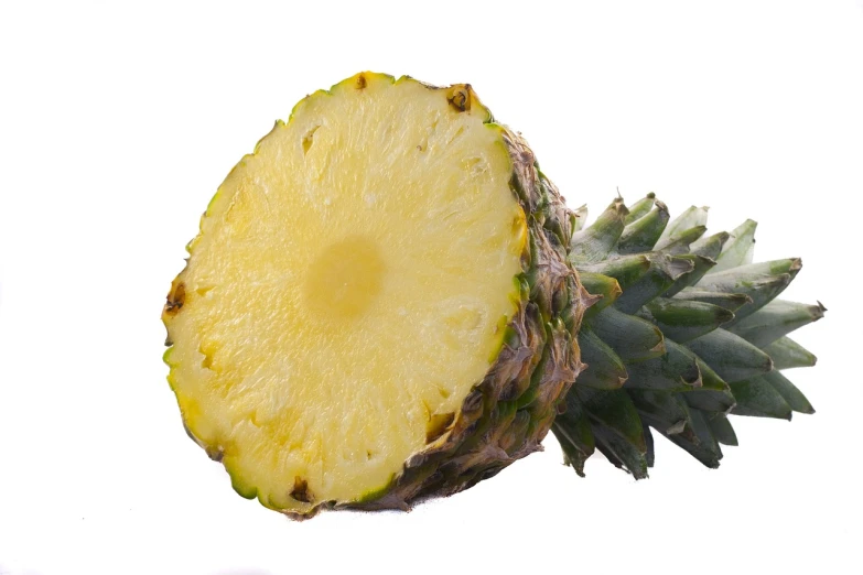 a pineapple cut in half on a white surface, by Robert Medley, renaissance, detailed zoom photo, -h 1024, highly detailed picture, 2000s photo