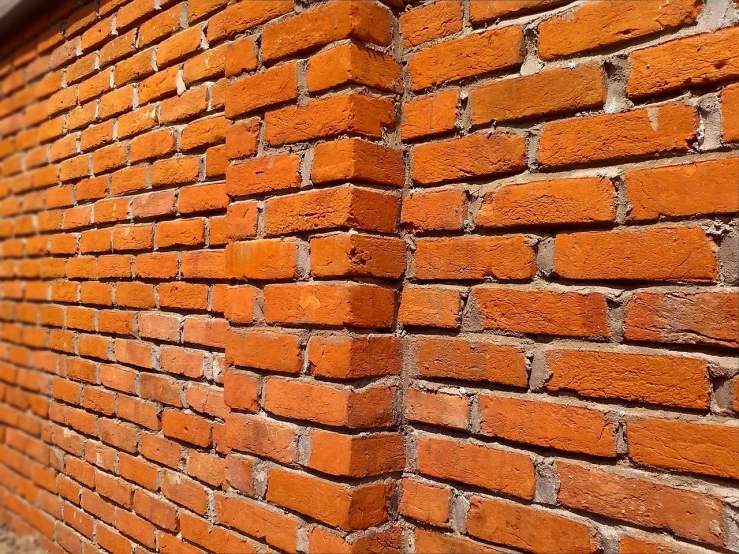 a fire hydrant in front of a brick wall, a stock photo, by Bernardino Mei, visual art, varying angles, wall corner, 155 cm tall, orange extremely coherent