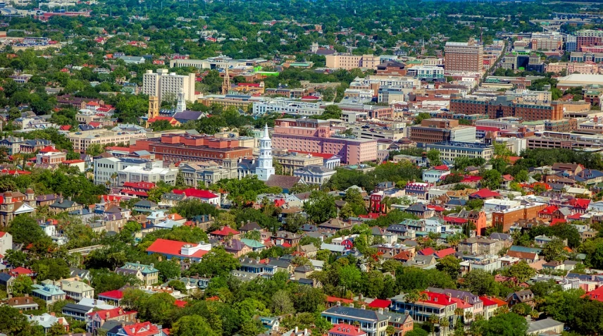 a view of a city from a bird's eye view, by Dave Melvin, in savannah, high color saturation, hi resolution, white buildings