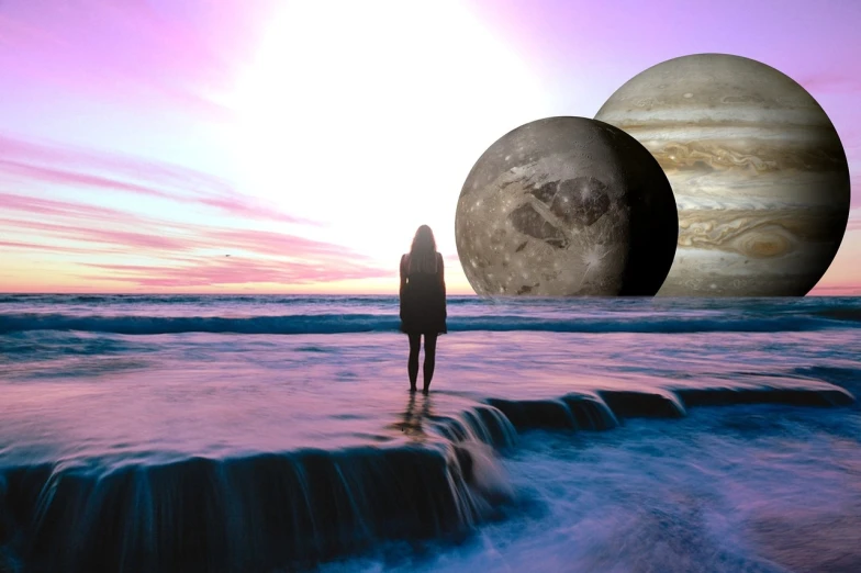 a person standing on the edge of a body of water with two planets in the background, digital art, tumblr, surrealism, to honor jupiter, standing at the beach, “ femme on a galactic shore, universal shadowing