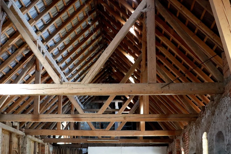 a living room filled with furniture and a wooden ceiling, by Abraham van Beijeren, pexels, red trusses, inside a barn, hoog detail, img _ 9 7 5. raw