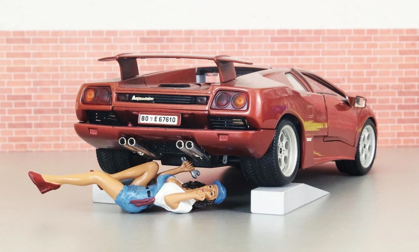 a figurine of a woman laying on the ground next to a red sports car, tumblr, hyperrealism, pink lamborghini aventador, his legs spread apart, kastuhiro otomo, wallpaper - 1 0 2 4